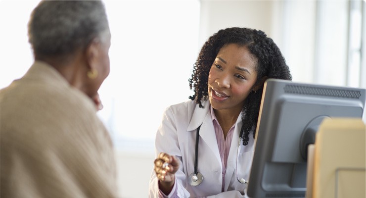0194_123317990 doctor talking to an older female patient