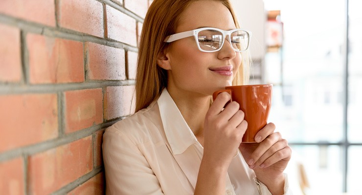 0464_683608074 image of woman drinking from a mug