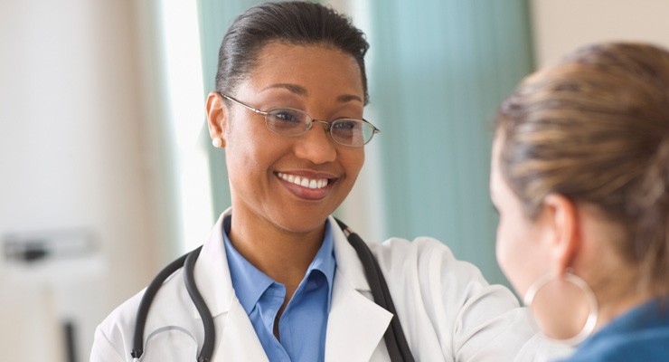 0352_56970853 female doctor talking to female patient