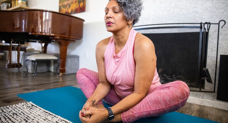 0091-1301440621 woman on yoga mat