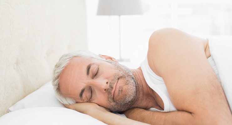 0075_479683931 man sleeping in bed